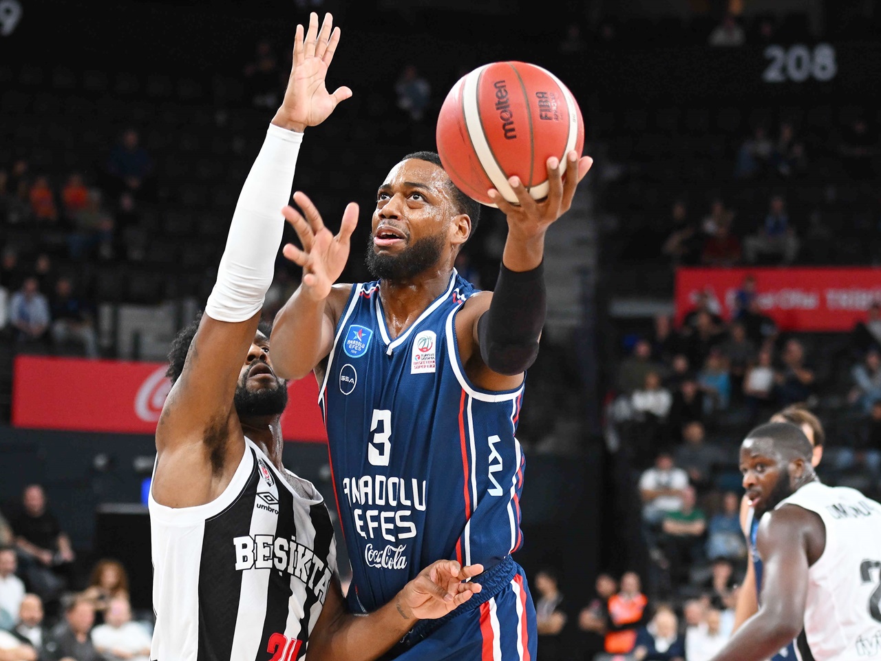 Match Action During Anadolu Efes vs Besiktas Turkish Super League Derby Players from Anadolu Efes and Besiktas compete in match action during the Turkish Basketball Super League derby at Turkcell Basketball Development Centre in Istanbul.